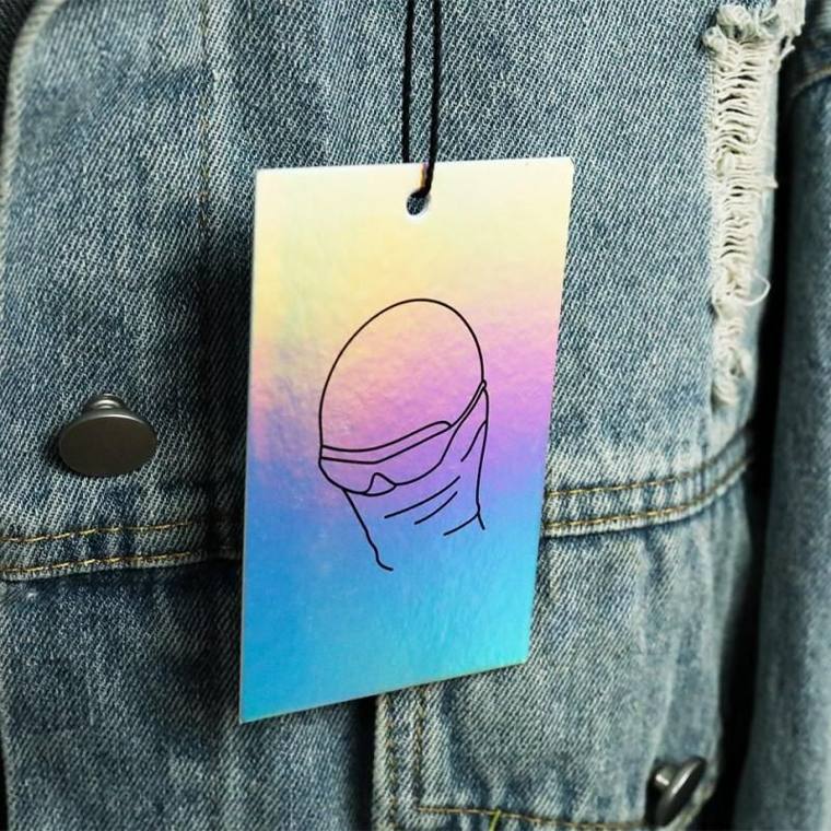 Holographic hang tag on denim